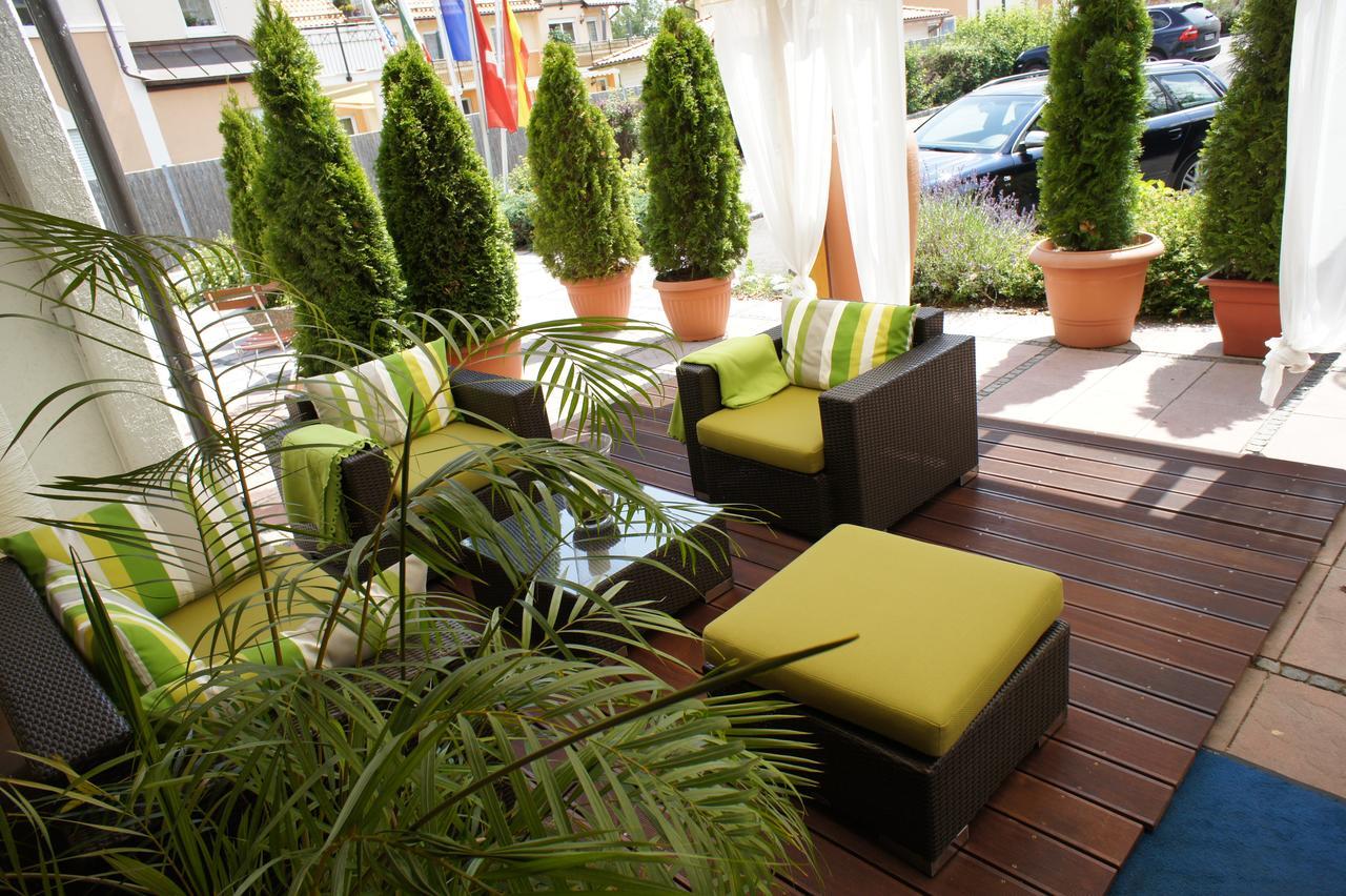 Hotel Am Krone Park Ольхинг Экстерьер фото
